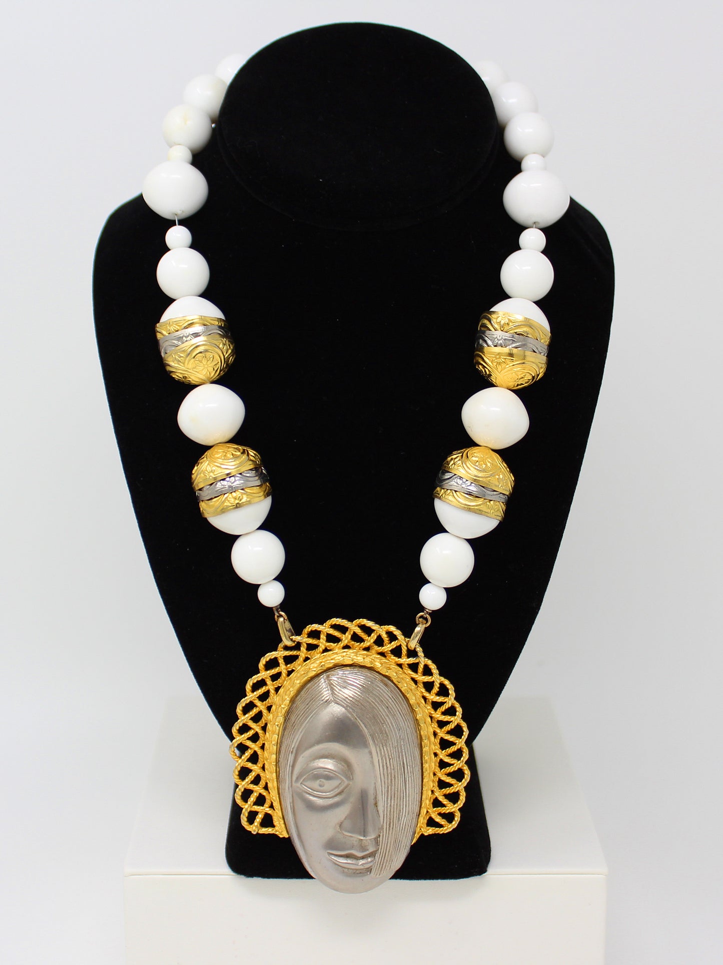 Vintage Deco Style Face Pendant Necklace with Large White Plastic Beads and Decorative Gold and Silver Tone Bead Caps