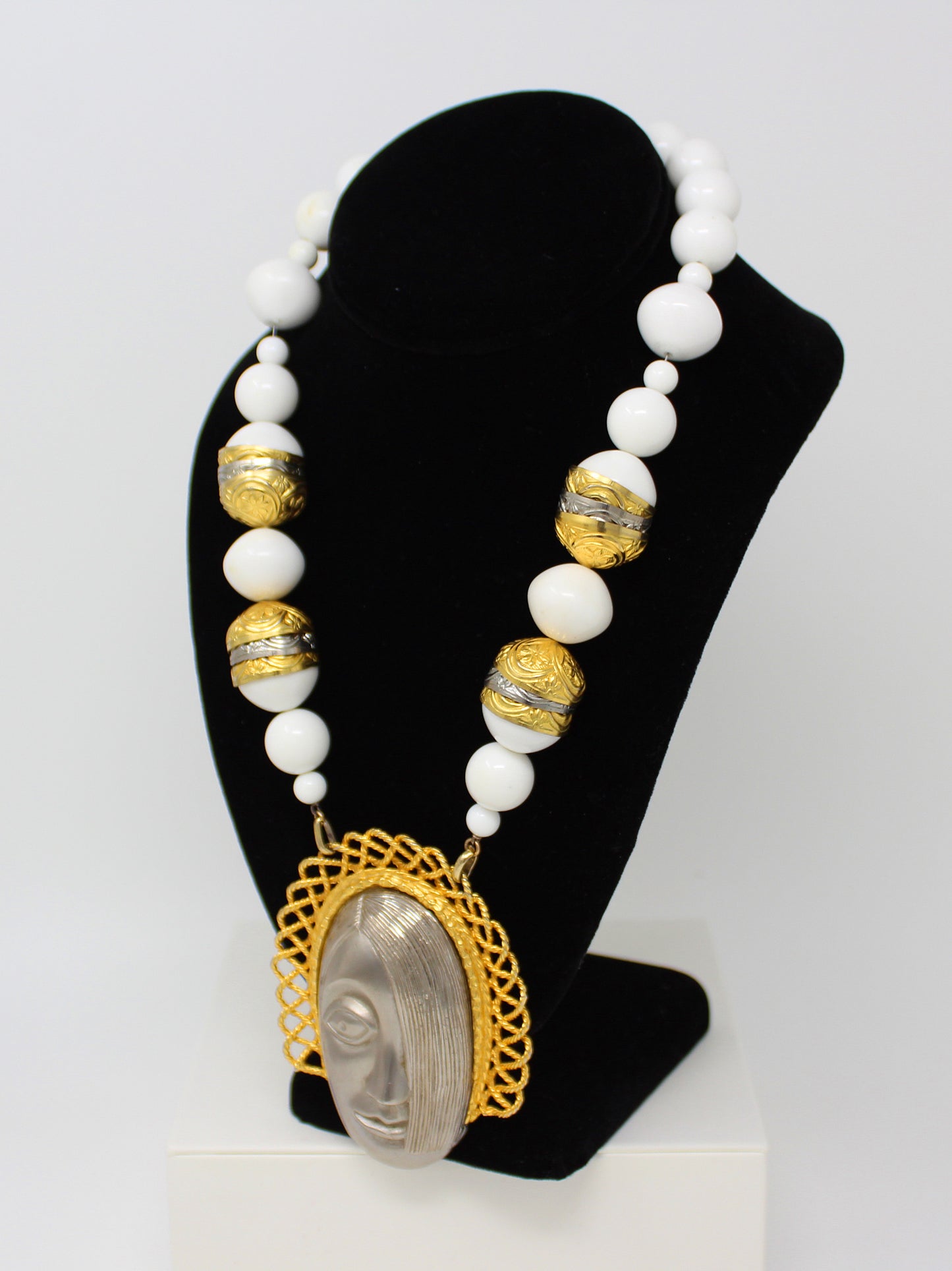 Vintage Deco Style Face Pendant Necklace with Large White Plastic Beads and Decorative Gold and Silver Tone Bead Caps