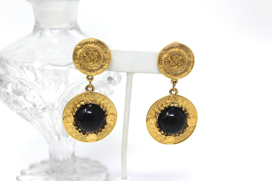 Signed St John Embossed Gold Tone Drop Earrings with Black Center Glass Stone